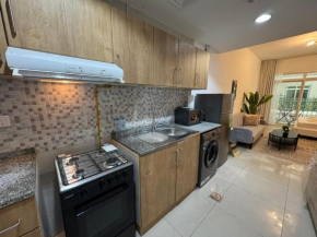ASHRI HH Spacious Studio in May Residence JVC